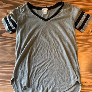 Green t-shirt with black trim